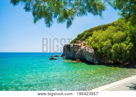 Achlia beach Crete Greece romantic beautiful empty beach azure sea with stones