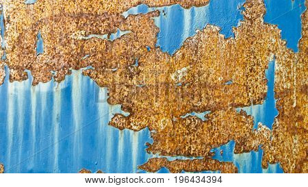 texture of rust pattern on blue metal background.
