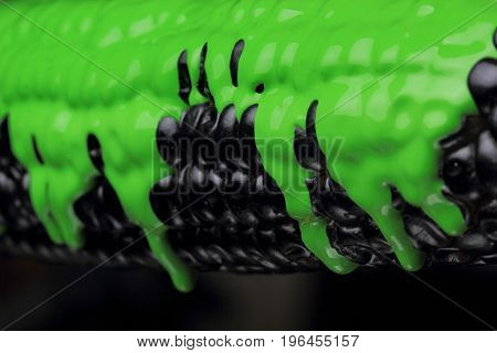Black Corn With Pouring Green Paint Background, Macro Closeup.texture