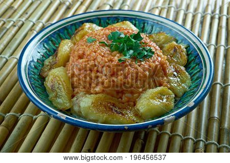 jollof rice with fried plantains. Nigerian cuisine