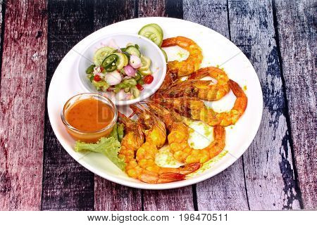 Charcoal Boiled ,prawn Satay Served With Side Disk.