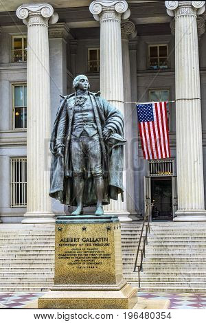 Albert Gallatin Statue US Flag US Treasury Department Washington DC. Statue by James Fraser and dedicated in 1947.