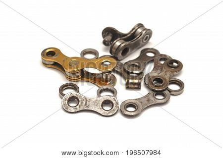 disassembled bicycle chain in rivets and links isolated on white background