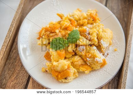 Home made Traditional austrian kaiserschmarrn with apricots
