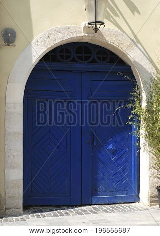 Old blue wooden door. Lviv Rynok Square.