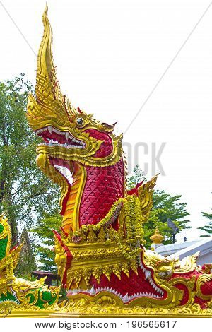 Red Naga sculpture on the stairs of Luang Phor Ngern statue at Wat Paknam Boong Sapang Ubonratchathani.