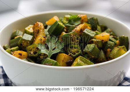 Indian masala fried bhindi or bhendi or Okra or ladyfinger curry or sabji, selective focus
