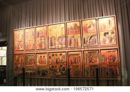 Italy Siena - December 26 2016: Maesta with the stories og Christ is the famous painting of Duccio di buoninsegna 1308-11 in museo dell'Opera metropolitana del Duomo on December 26 2016 in Siena Tuscany Italy.