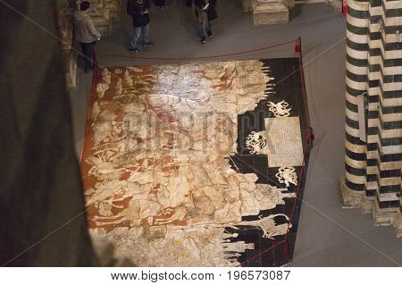 Siena Italy - Decmber 26 2016: Interior of Siena Cathedral Italian Duomo di Siena Santa Maria Assunta. The 13th century church with its mosaic floor is a major tourism attraction in Siena Tuscany Italy