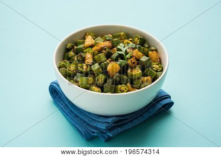 Indian masala fried bhindi or bhendi or Okra or ladyfinger curry or sabji, selective focus