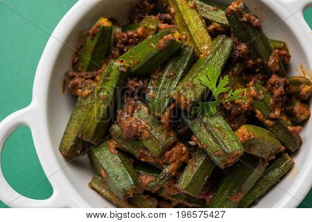 Indian masala fried bhindi or bhendi or Okra or ladyfinger curry or sabji, selective focus
