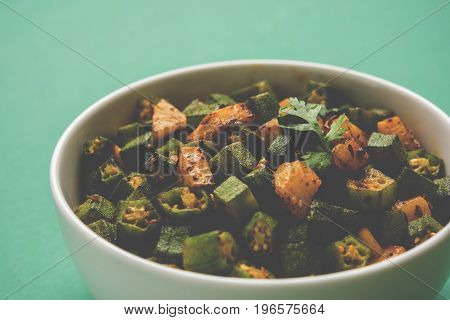 Indian masala fried bhindi or bhendi or Okra or ladyfinger curry or sabji, selective focus