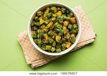 Indian masala fried bhindi or bhendi or Okra or ladyfinger curry or sabji, selective focus