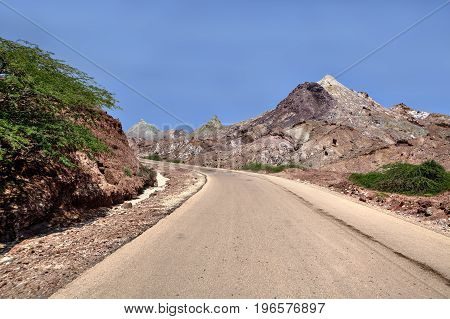 Empty road in deserted area Hormuz Island Hormozgan Province Iran.