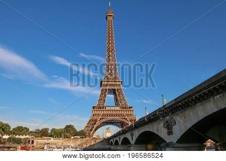 The famous Eiffel tower is the most visited monument of France and Iena bridge, Paris, France.