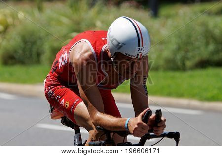NICE - JULY 27 2017 : IRONMAN Nice 2017. Competitor at the end of the 180 km bike tour.Christophe QUARTIER (293) finishing the bike tour.