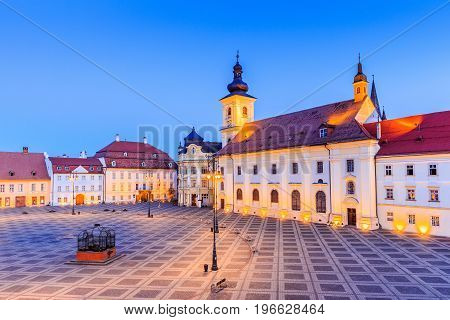 Sibiu Romania. Large Square (Piata Mare) with the City Hall and Brukenthal palace in Transylvania.