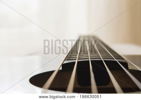 Selective focus, macro lens, shooting retro classic vintage guitar, focus on strings
