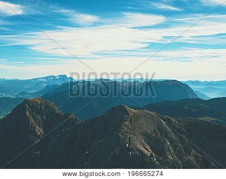 View From The Top Of Alpine Mountain Of The Mountains Around. Spring In The Mountains.