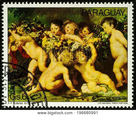 Moscow Russia - July 23 2017: A stamp printed in Paraguay shows painting Crown of Fruit by Rubens series 