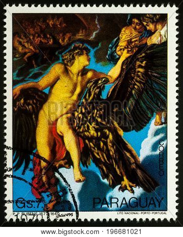 Moscow Russia - July 23 2017: A stamp printed in Paraguay shows painting Abduction of Ganymede by Rubens series "Paintings by Peter Paul Rubens" circa 1978