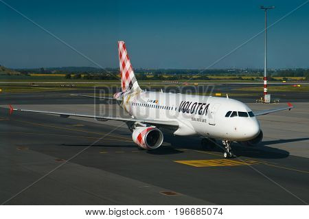 PRAGUE CZECH REPUBLIC - MAY 26: Airbus A319 Volotea taxi to terminal at PRG Airport in Prague on May 26 2017. Volotea is a Spanish low cost company.
