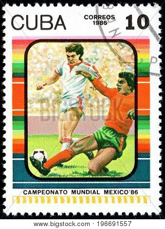 UKRAINE - CIRCA 2017: A postage stamp printed in Cuba shows Football Player's from series FIFA World Cup 1986 - Mexico circa 1986