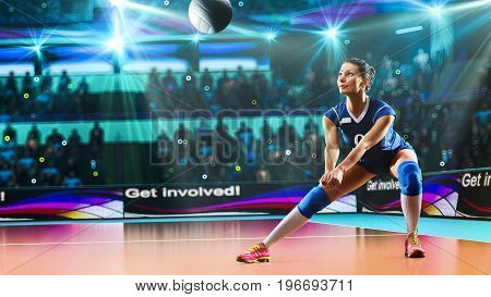 Female professional volleyball player on grand court in hilights