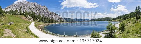 Lake in summer near mountain Gartnerkofel on Nassfeld in Carnic Alps in Austria