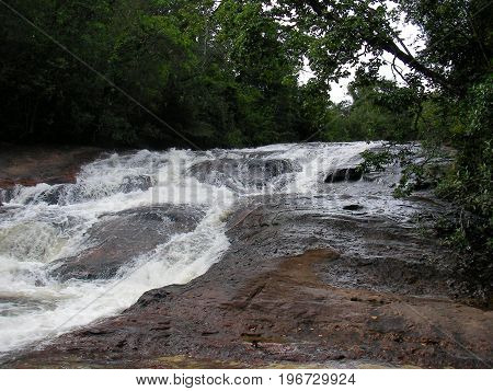 Waterfall in French Guyana rainforest, south america.