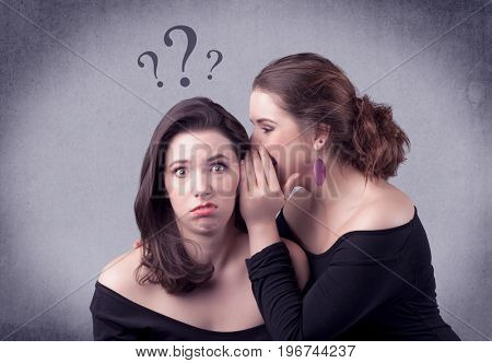 A teenager girl looking confused with drawn question marks above the head, while a girlfriend whispers something in her ear concept.