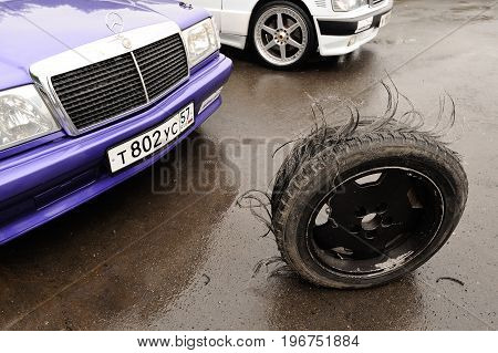 Orel Russia July 22 2017: Dynamica car festival. Extremely worn car tyre closeup