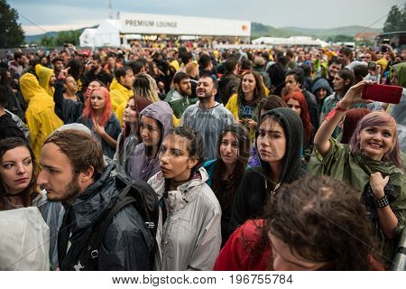 Headbanging Crowd In The First Row At A Hardcore Concert
