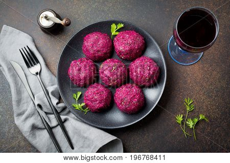 Snack of beet cabbage walnut and cilantro. Traditional Georgian dish Pkhali. Selective focus.Top view. Copy space.