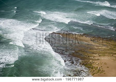 a sea of the atlantic osean at the coast at the village of Luz at the Algarve of Portugal in Europe.