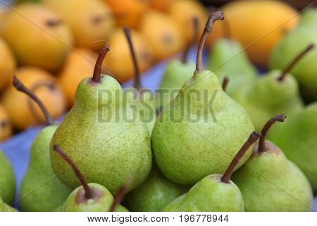 peer fruit in indian foos market stall