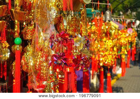 HONG KONG, CHINA - JANUARY 22, 2017: Colorful presents at the enter of Wong Tai Sin Buddhist Temple to pray, in Hong Kong, China.