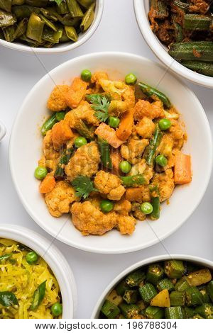 indian spicy food Gobi matar Masala or cauliflower curry with green peas or phool gobi fry, selective focus