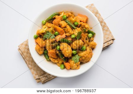 indian spicy food Gobi matar Masala or cauliflower curry with green peas or phool gobi fry, selective focus
