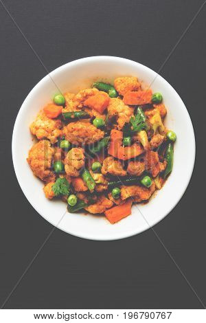 indian spicy food Gobi matar Masala or cauliflower curry with green peas or phool gobi fry, selective focus
