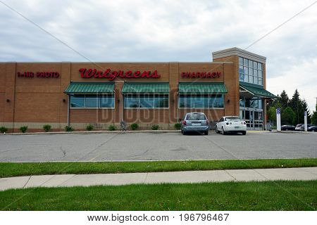 BIG RAPIDS, MICHIGAN / UNITED STATES - MAY 22, 2017: One may fill prescriptions, print photographs, and purchase other merchandise at the Walgreens Pharmacy on State Street.