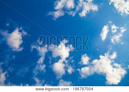 Blue nive sky and white clouds up view