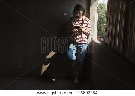 Woman traveler photographer holiday lifestyle trip