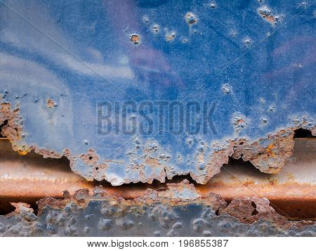 Grunge old crack and rusty metal plate texture blackground rusty car close up