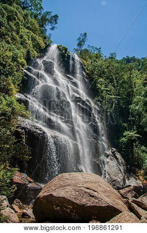 View of waterfall in the middle of the forest at the Itatiaia Park, an altitude park, known for its animal diversity, trails and waterfalls. Rio de Janeiro State, southwestern Brazil