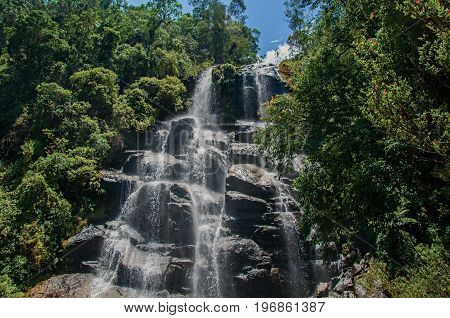 View of waterfall in the middle of the forest at the Itatiaia Park, an altitude park, known for its animal diversity, trails and waterfalls. Rio de Janeiro State, southwestern Brazil