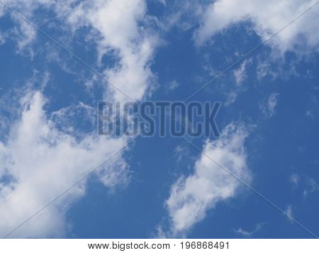 blue sky puffy with white clouds -  background