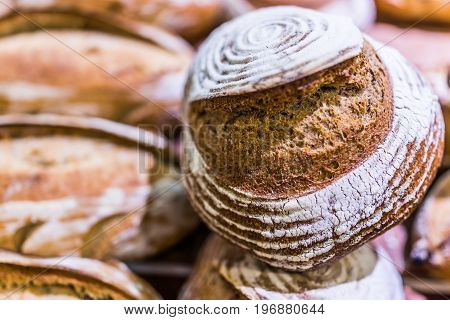 Closeup Of Circular Sourdough Baked Bread Loaf In Bakery