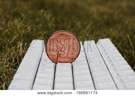 Dogecoin On White Keyboard