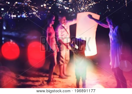 People Celebrate New Year. Fireworks circle blur. Colorful in celebration. Thailand Beach